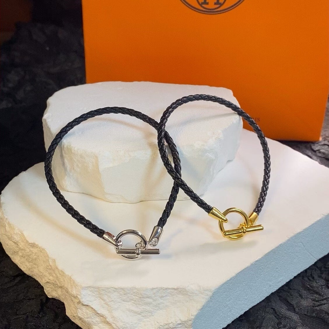 Hermès Braided Leather Toggle Bracelet – Gold & Silver Clasps