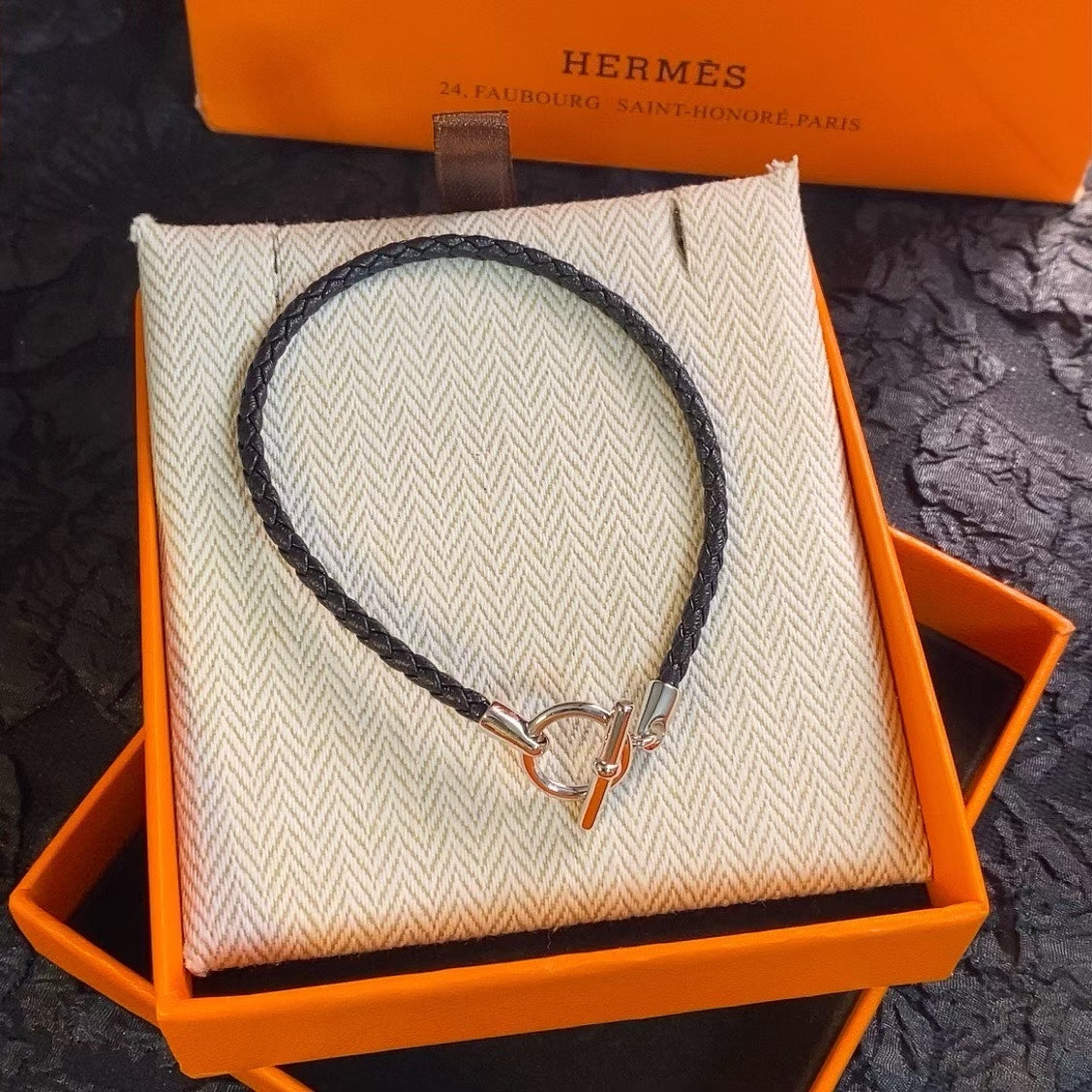 Hermès Braided Leather Toggle Bracelet – Gold & Silver Clasps