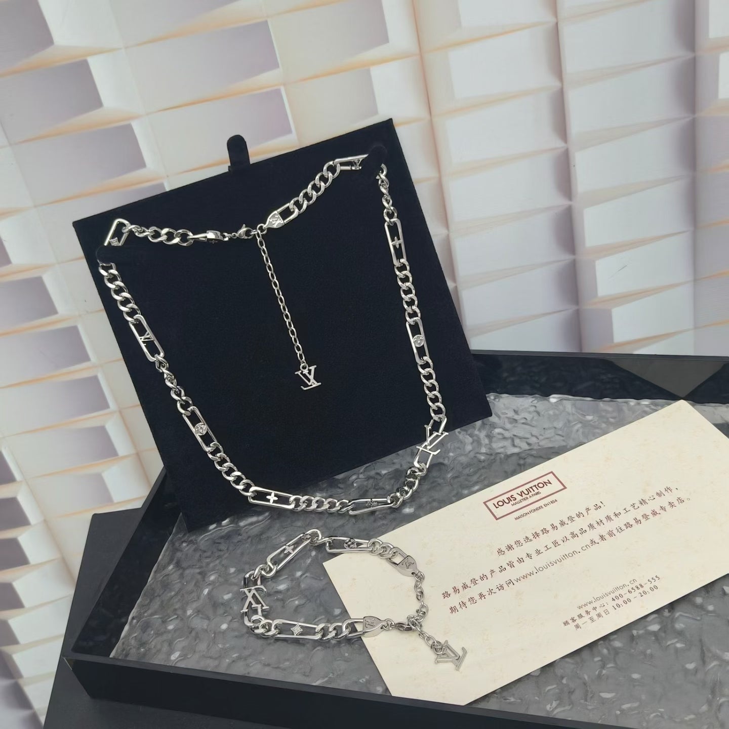 Louis Vuitton Engraved Segment Chain Jewelry – Silver-Toned with LV Logo Charms