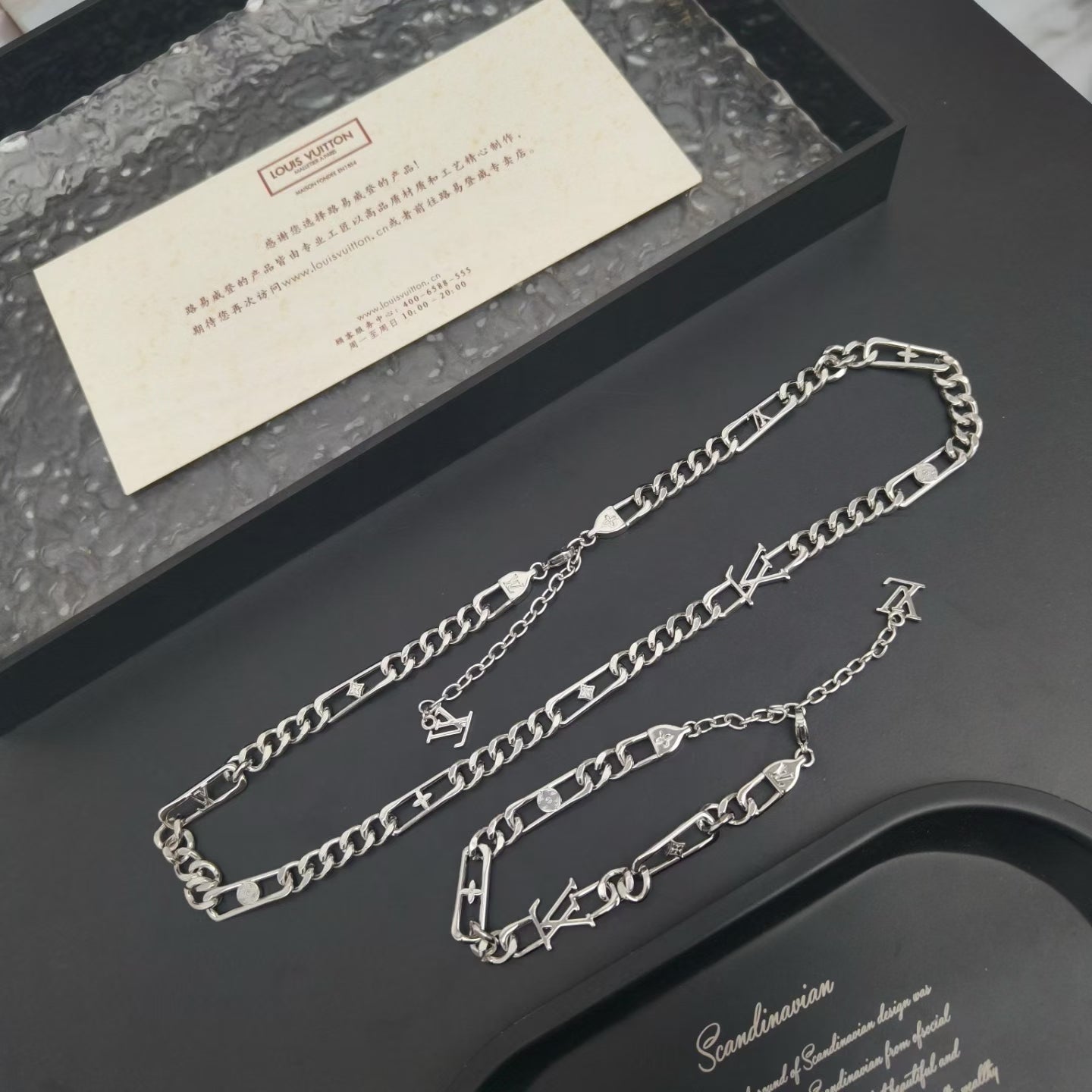 Louis Vuitton Engraved Segment Chain Jewelry – Silver-Toned with LV Logo Charms