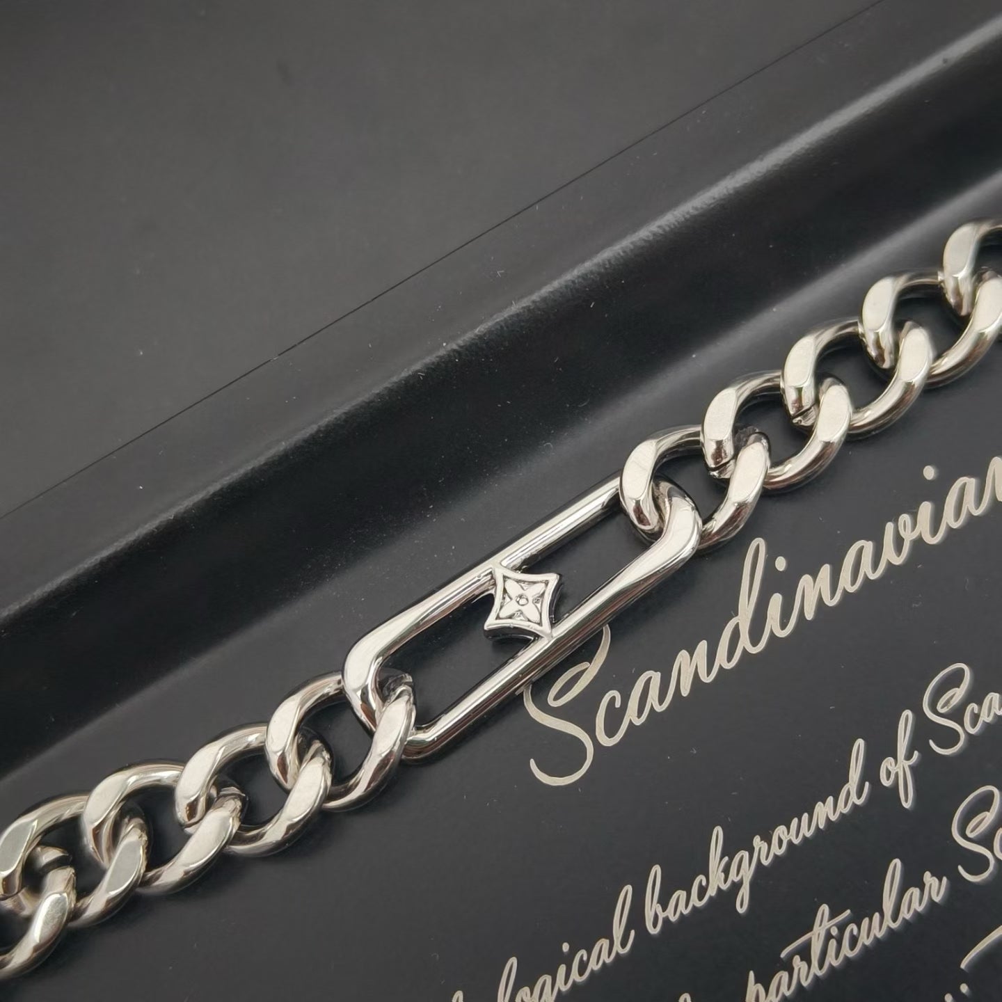 Louis Vuitton Engraved Segment Chain Jewelry – Silver-Toned with LV Logo Charms