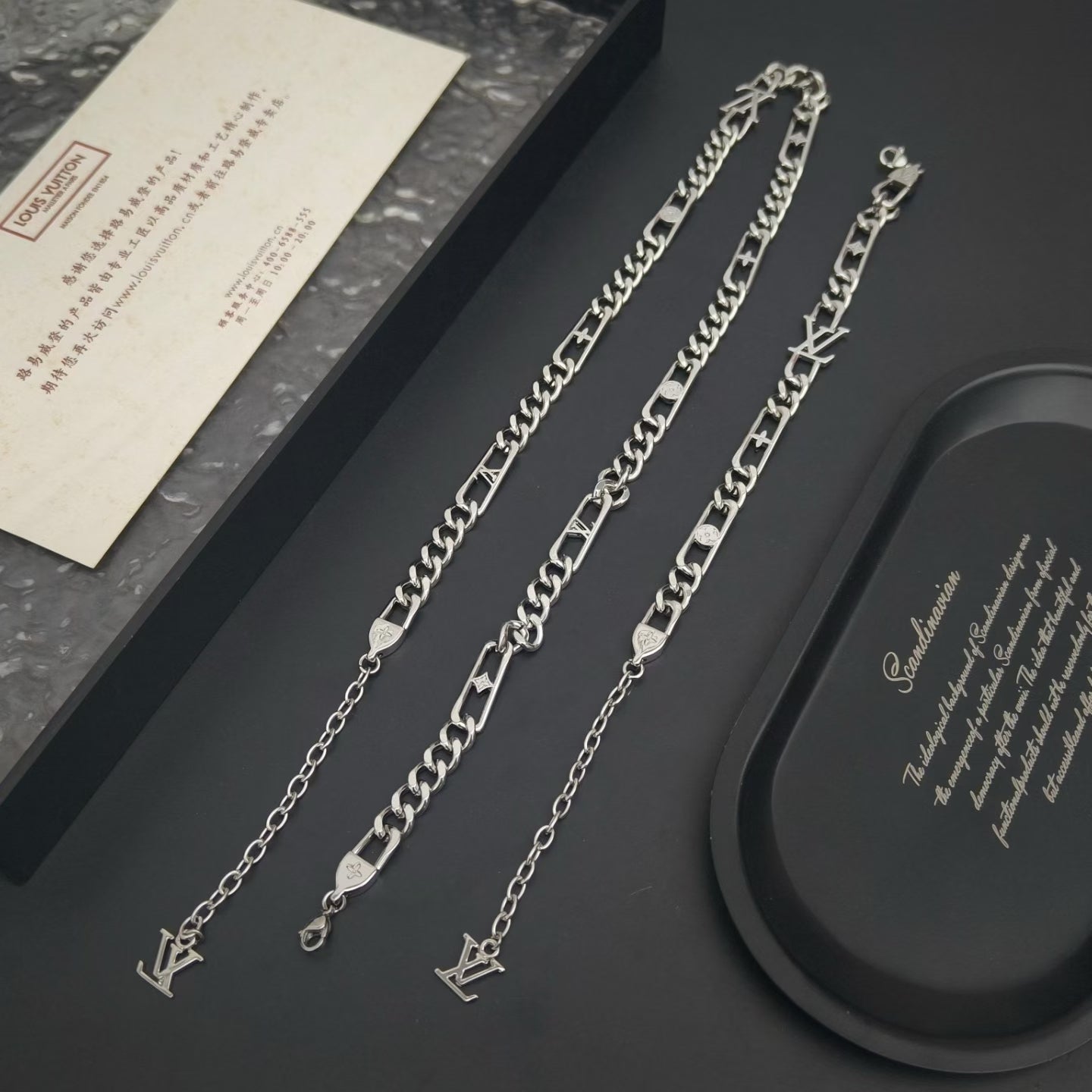 Louis Vuitton Engraved Segment Chain Jewelry – Silver-Toned with LV Logo Charms