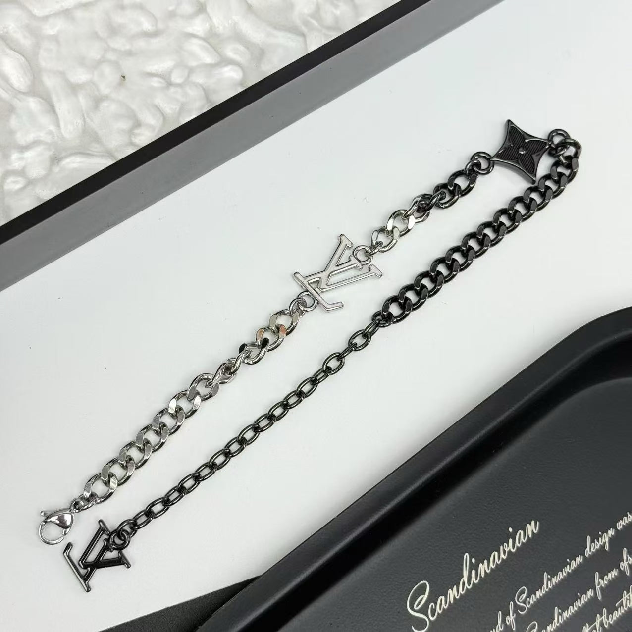 Louis Vuitton Silver & Black Chain Charm Bracelet – LV Logo & Star