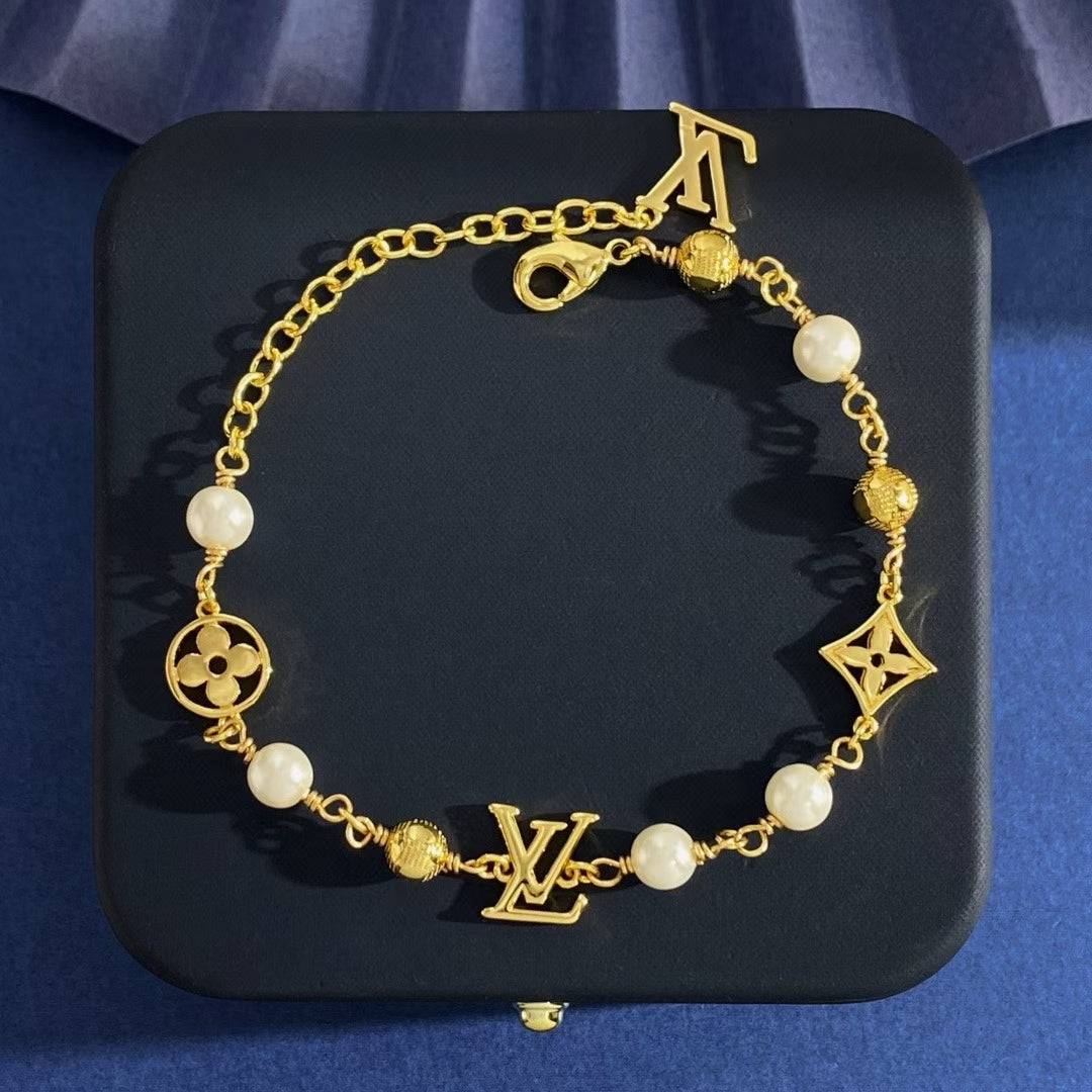 Louis Vuitton Metallic & Pearl Charm Bracelet – Gold & Silver Variants