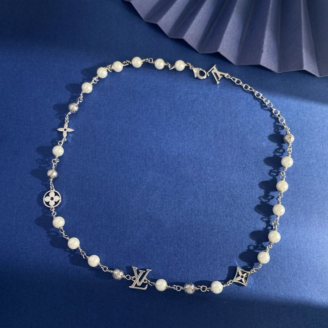 Louis Vuitton Spiral Pearl Charm Jewelry – Gold & Silver with LV Motifs