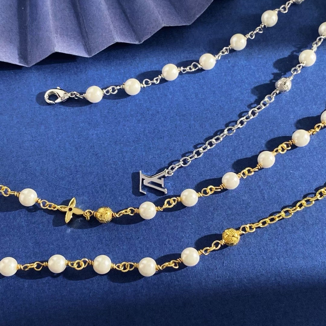 Louis Vuitton Spiral Pearl Charm Jewelry – Gold & Silver with LV Motifs