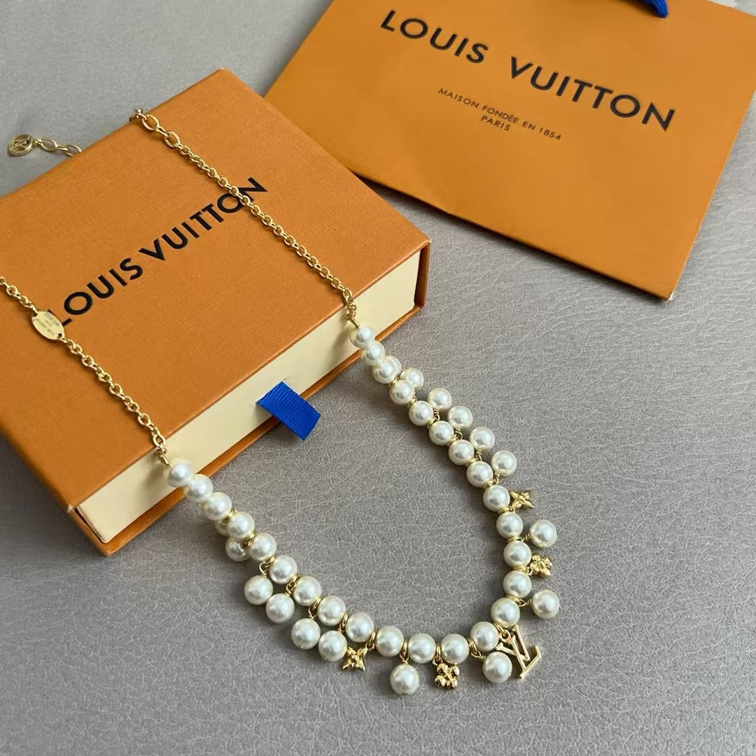 Louis Vuitton Pearl & Charm Bracelet – Gold Chain with LV Logo & Floral Motifs