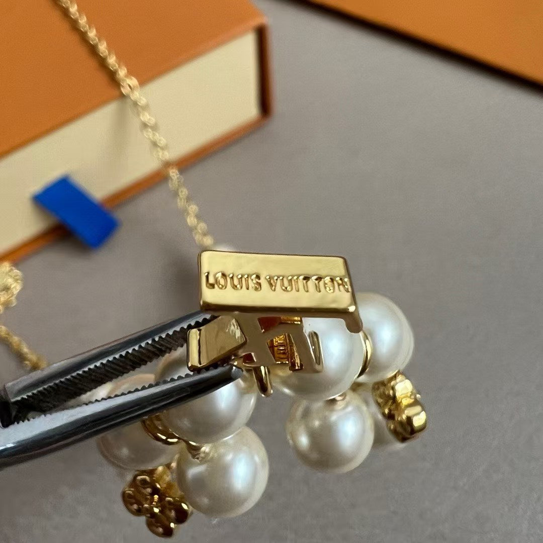 Louis Vuitton Pearl & Charm Bracelet – Gold Chain with LV Logo & Floral Motifs
