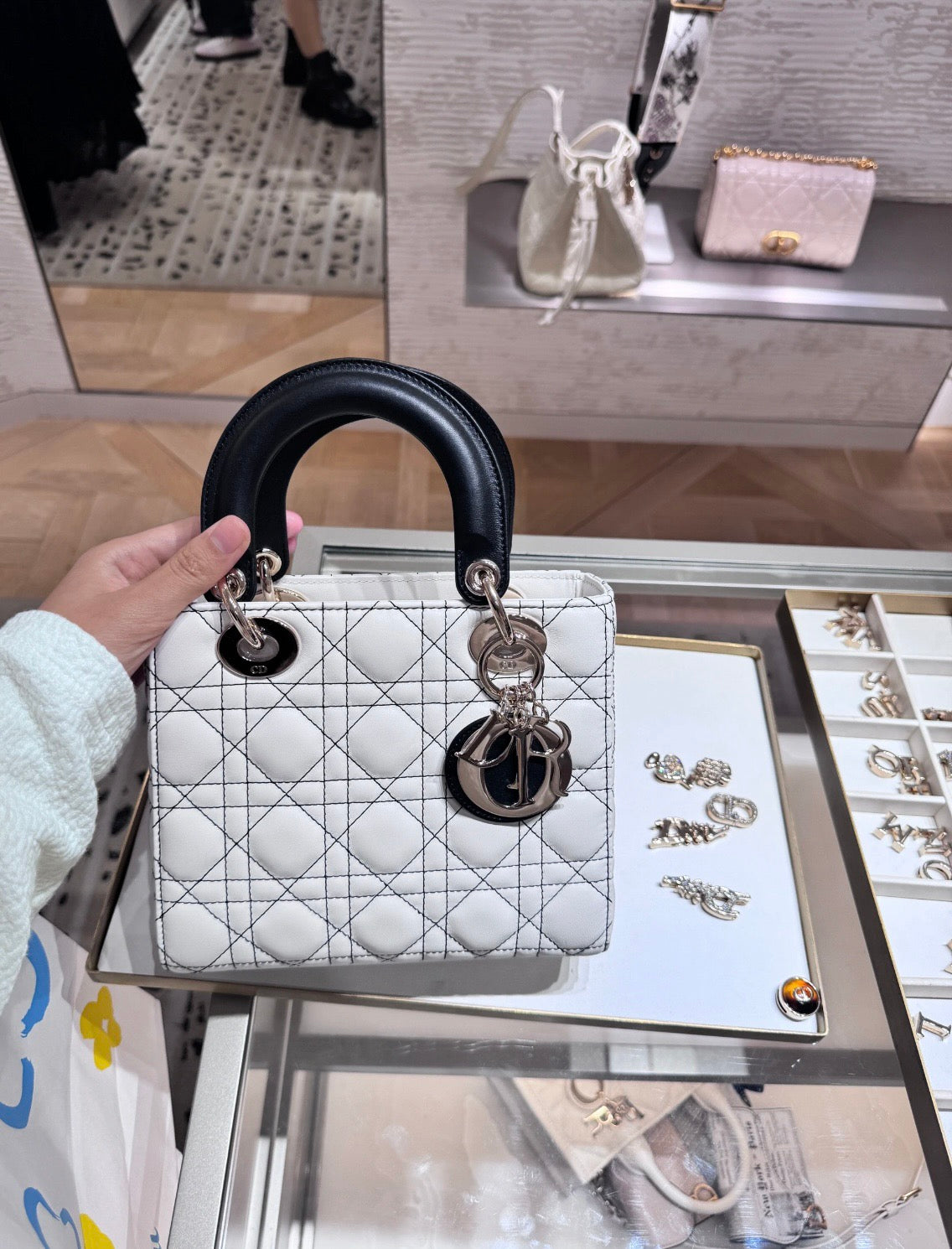Lady Dior Handbag – White Quilted Leather with Black Handles & Silver Charm