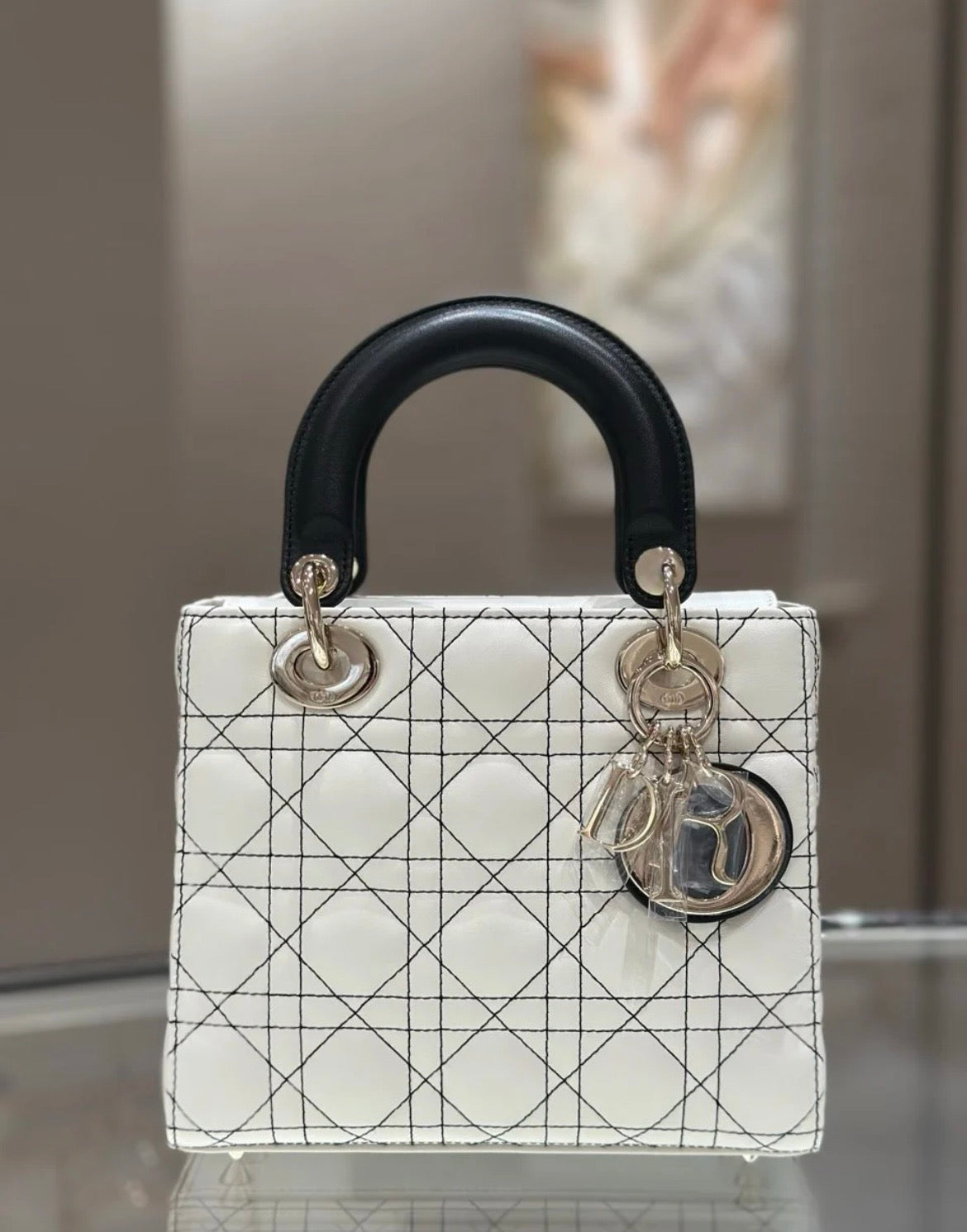 Lady Dior Handbag – White Quilted Leather with Black Handles & Silver Charm