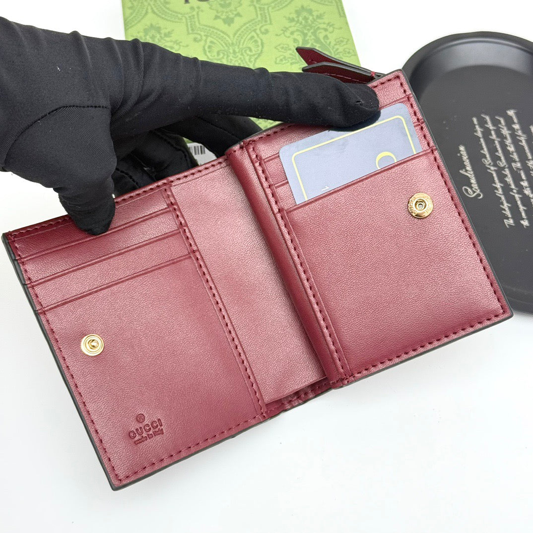 Gucci GG Embossed Leather Wallet