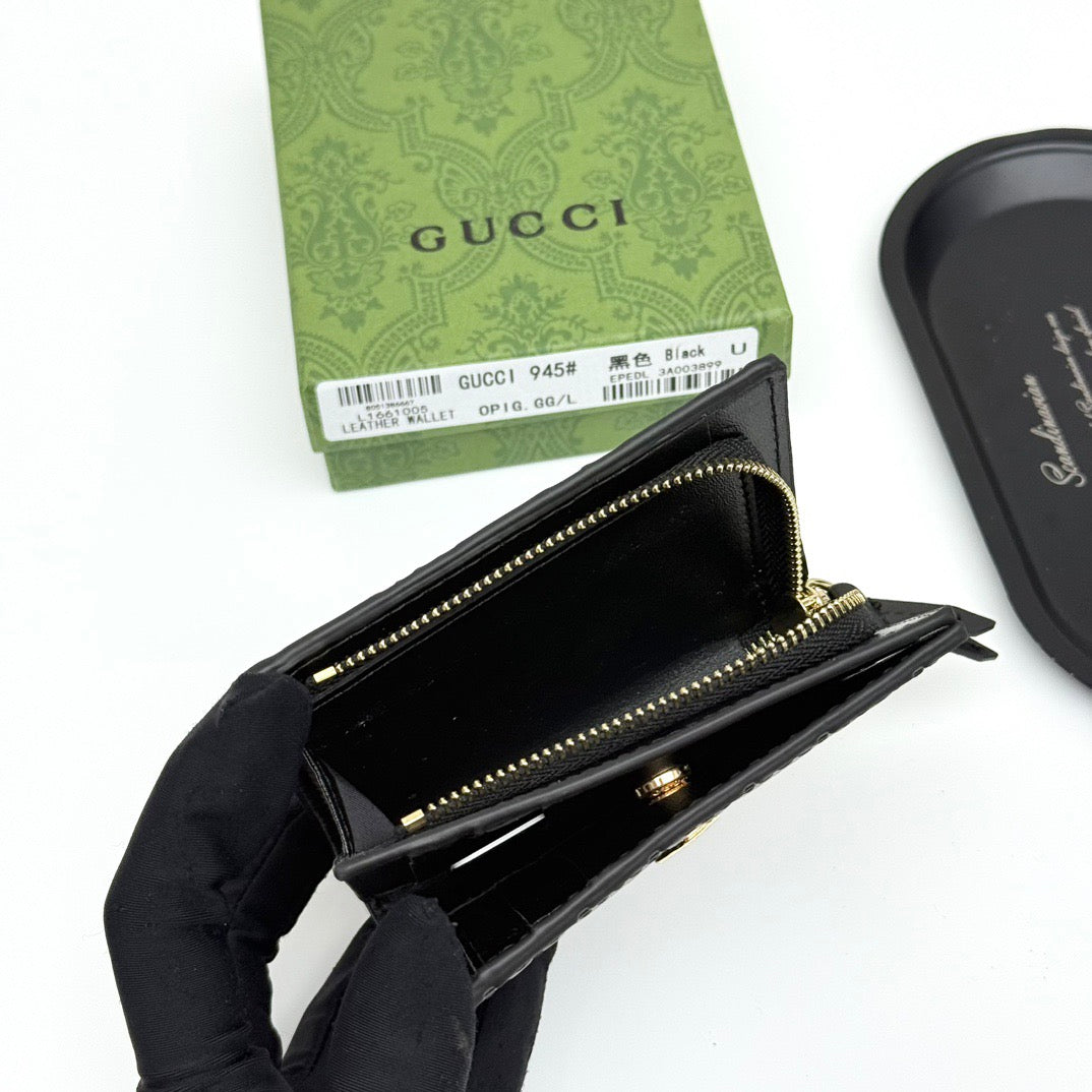Gucci GG Embossed Leather Wallet