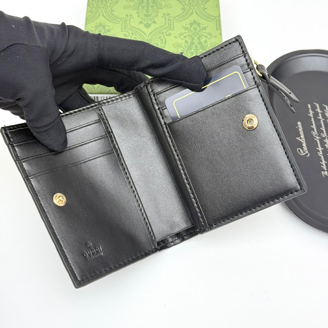 Gucci GG Embossed Leather Wallet