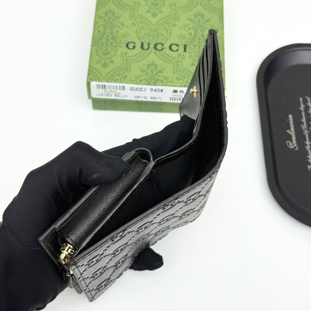 Gucci GG Embossed Leather Wallet