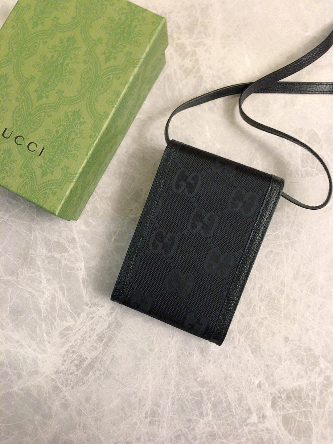 Gucci GG Embossed Leather Pouch Wallet