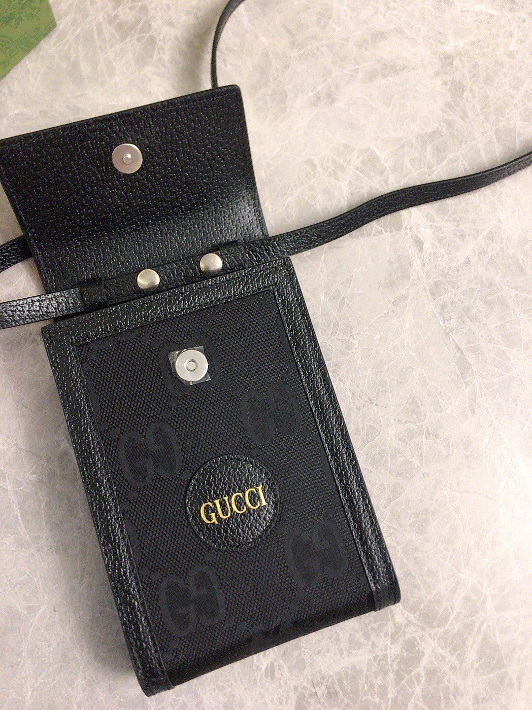 Gucci GG Embossed Leather Pouch Wallet
