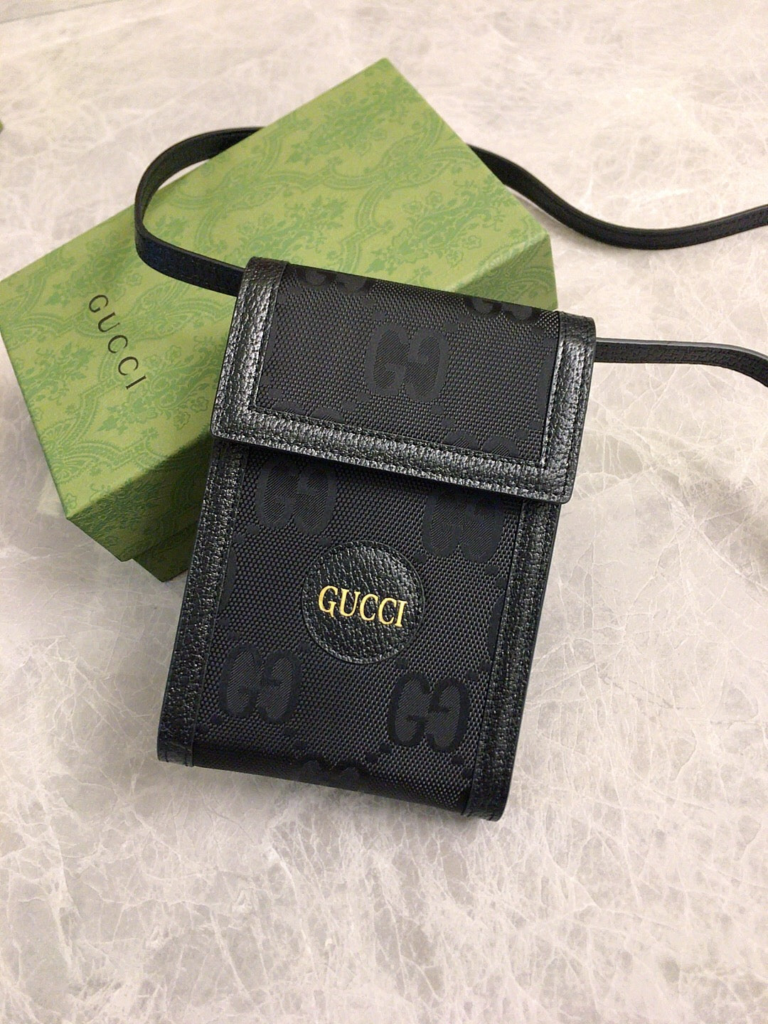 Gucci GG Embossed Leather Pouch Wallet