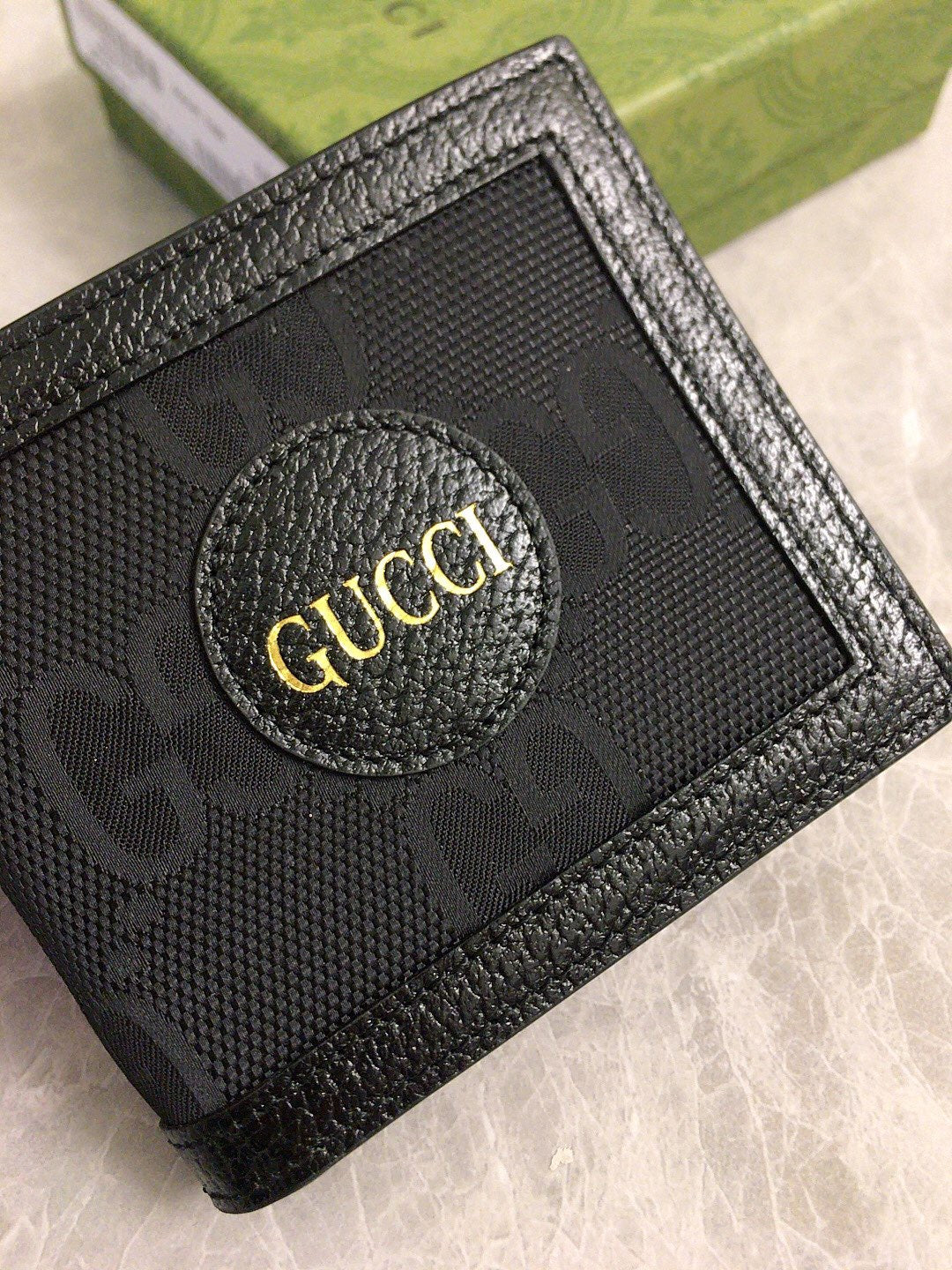 Gucci GG Embossed Zip Wallet Collection