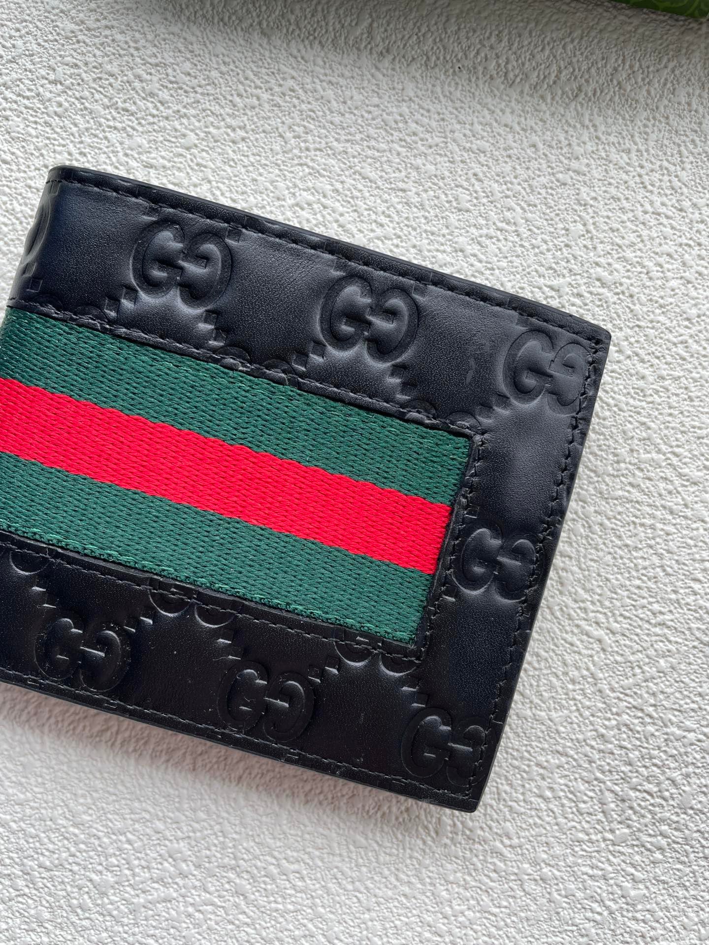 Gucci Black GG Embossed Wallet – Monogram Texture Edition