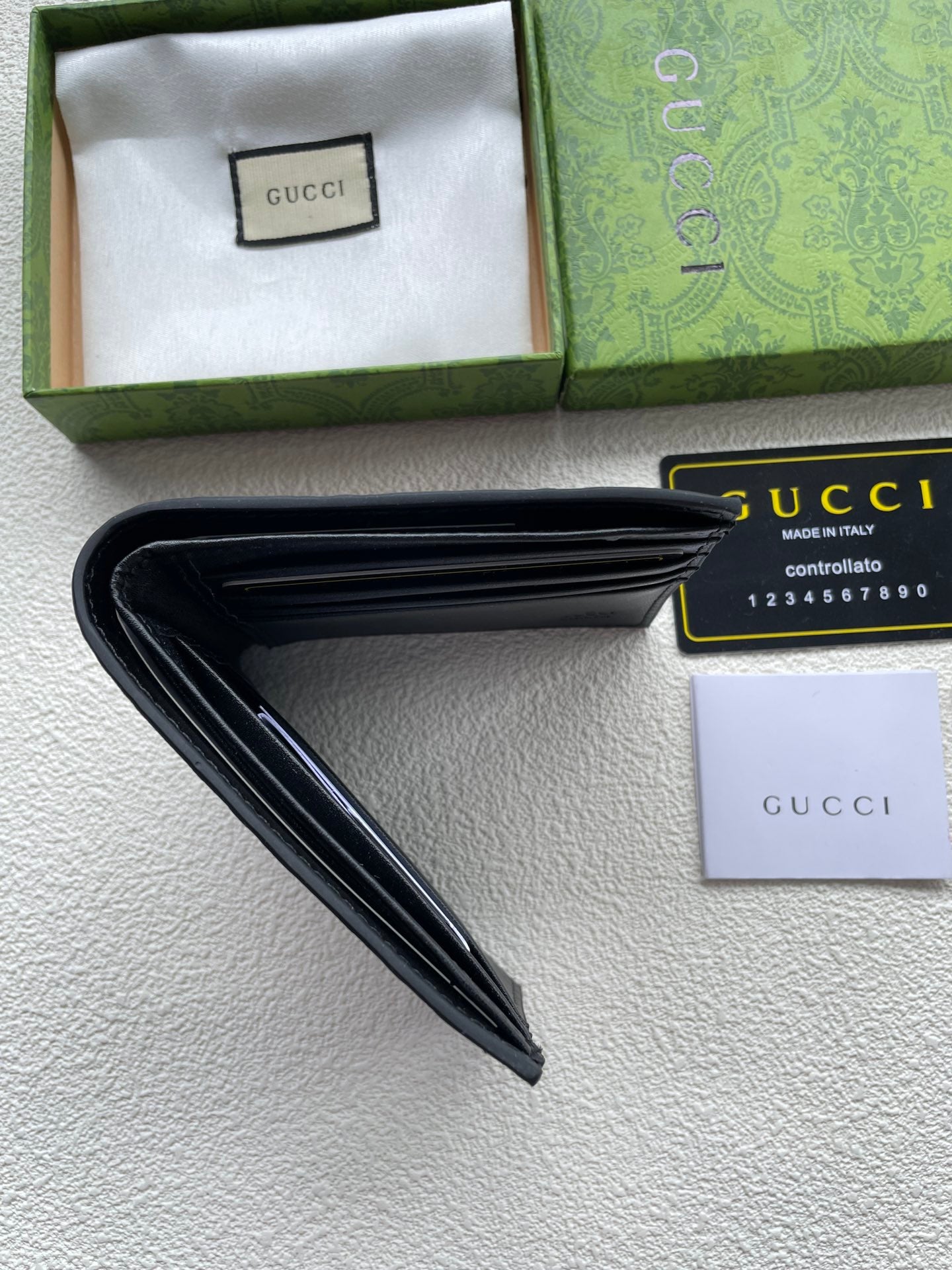 Gucci Black GG Embossed Wallet – Monogram Texture Edition