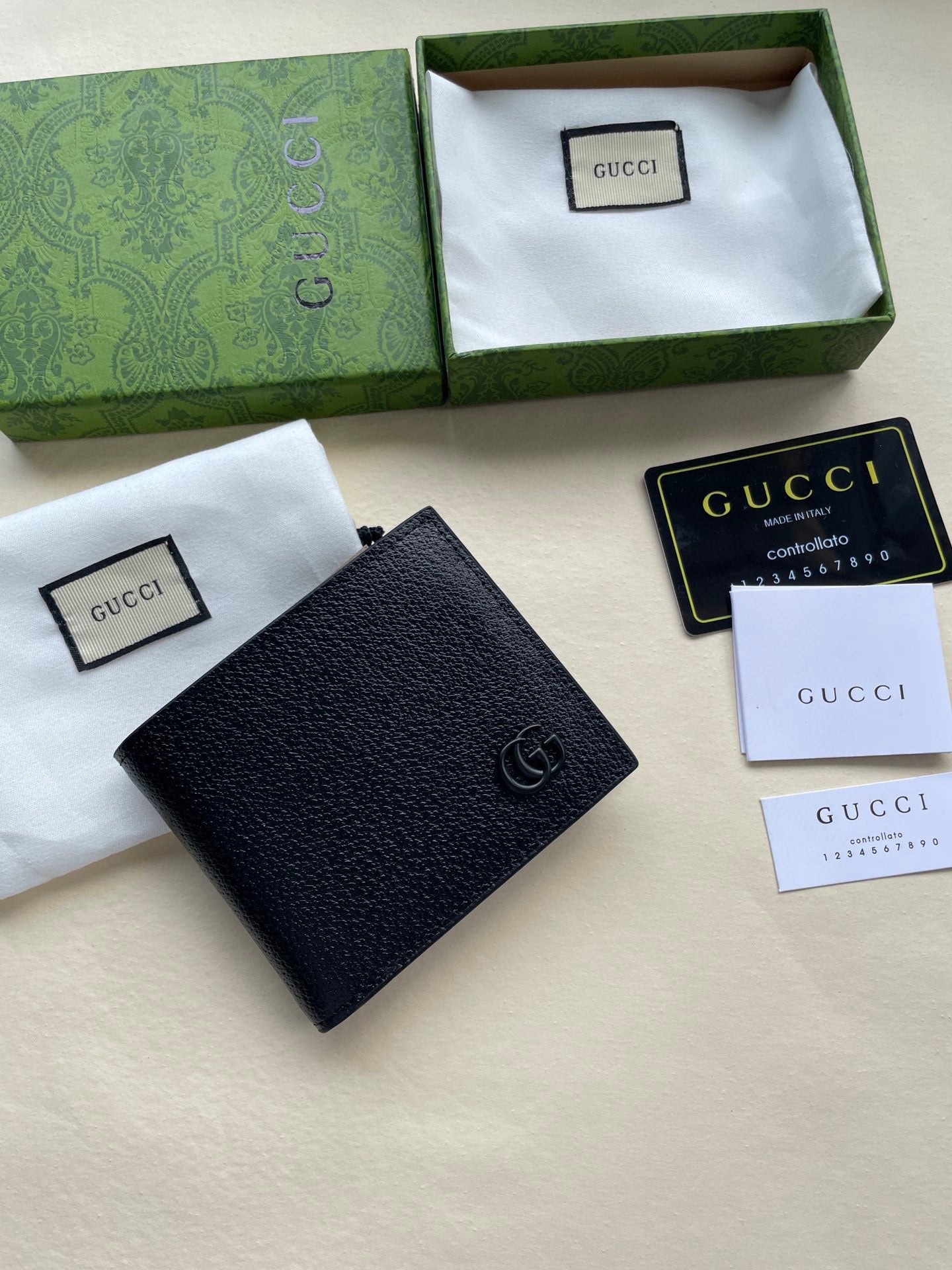 Gucci Black Embossed GG Calfskin Wallet
