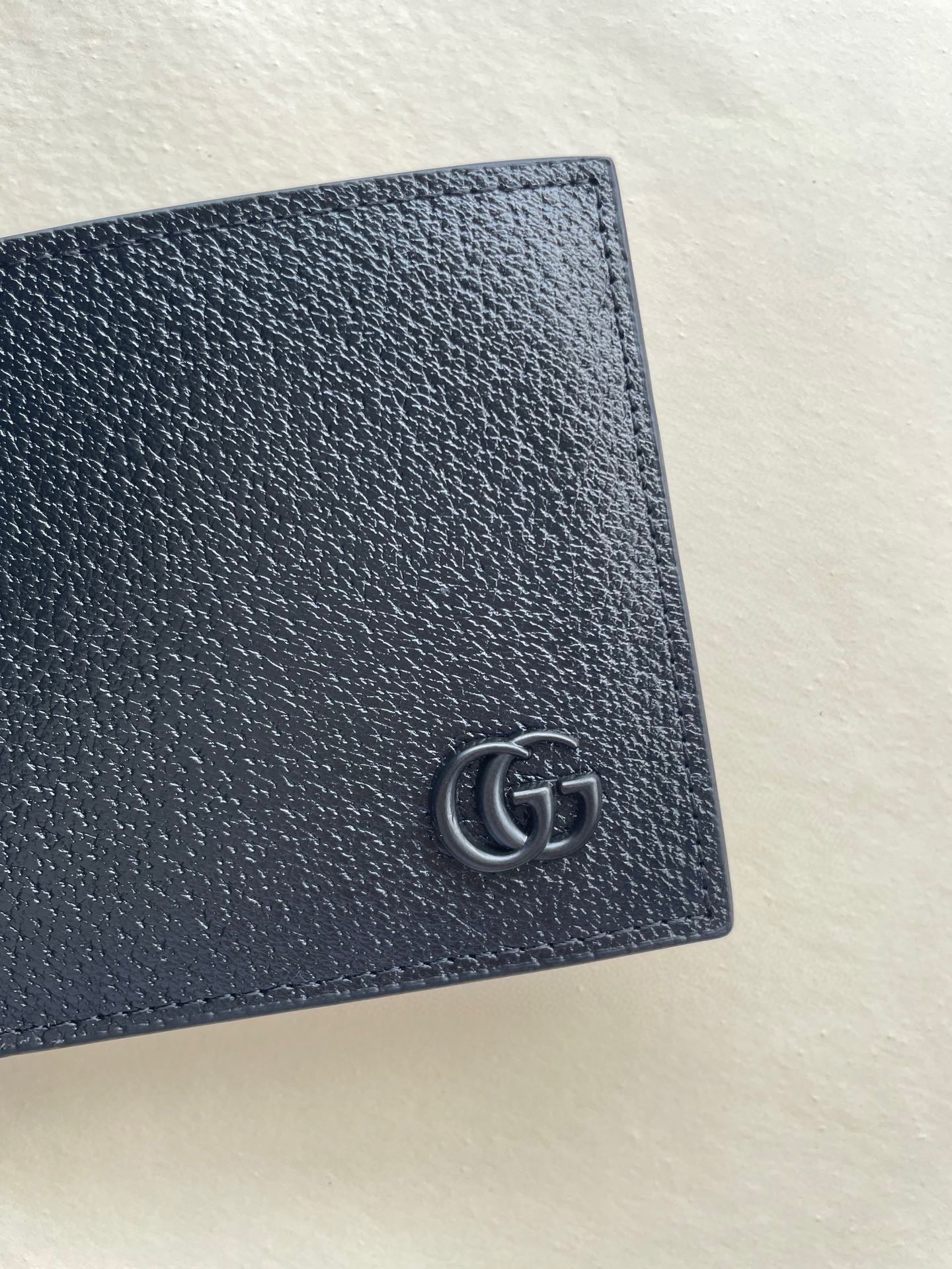 Gucci Black Embossed GG Calfskin Wallet