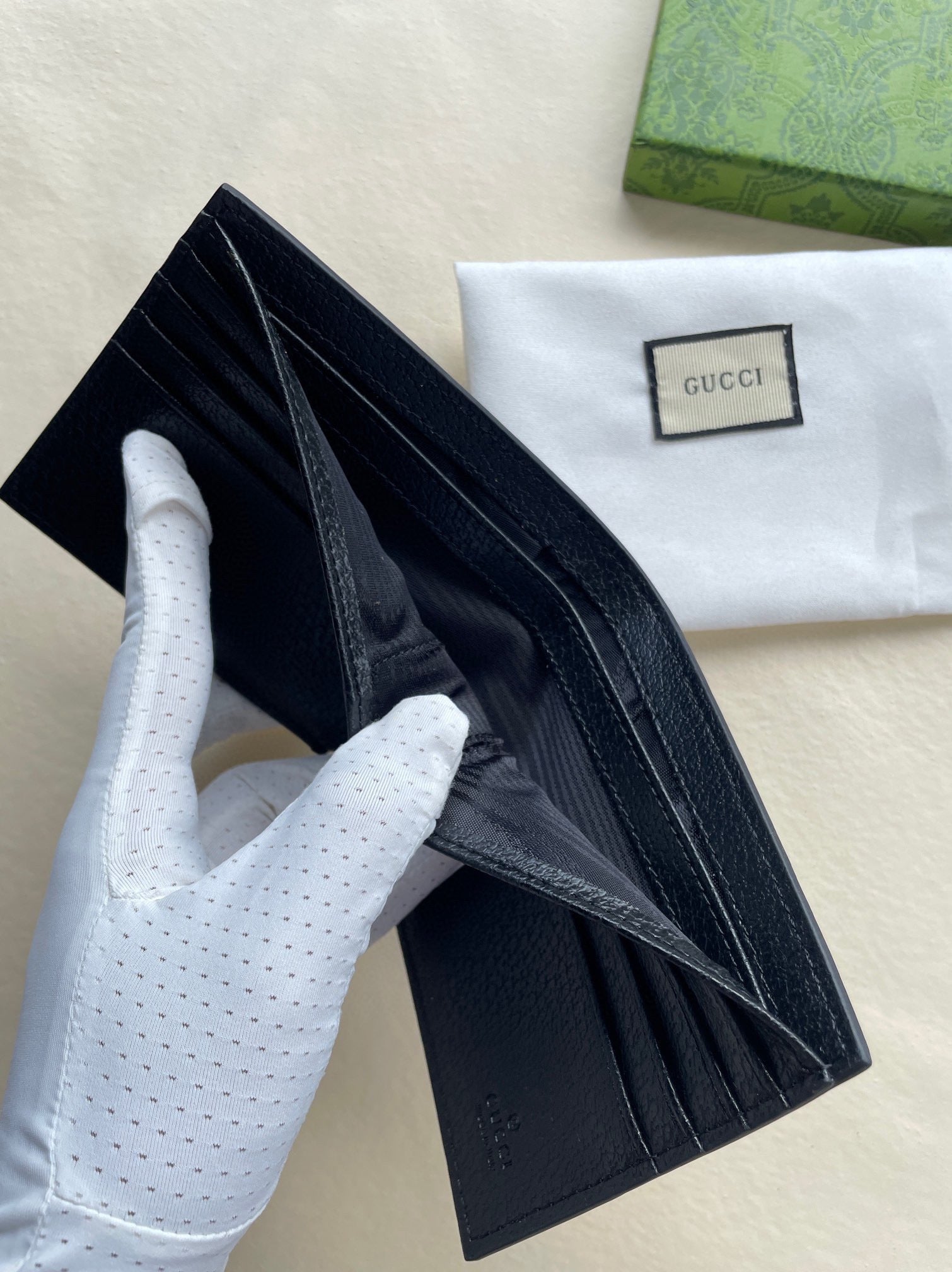 Gucci Black Embossed GG Calfskin Wallet