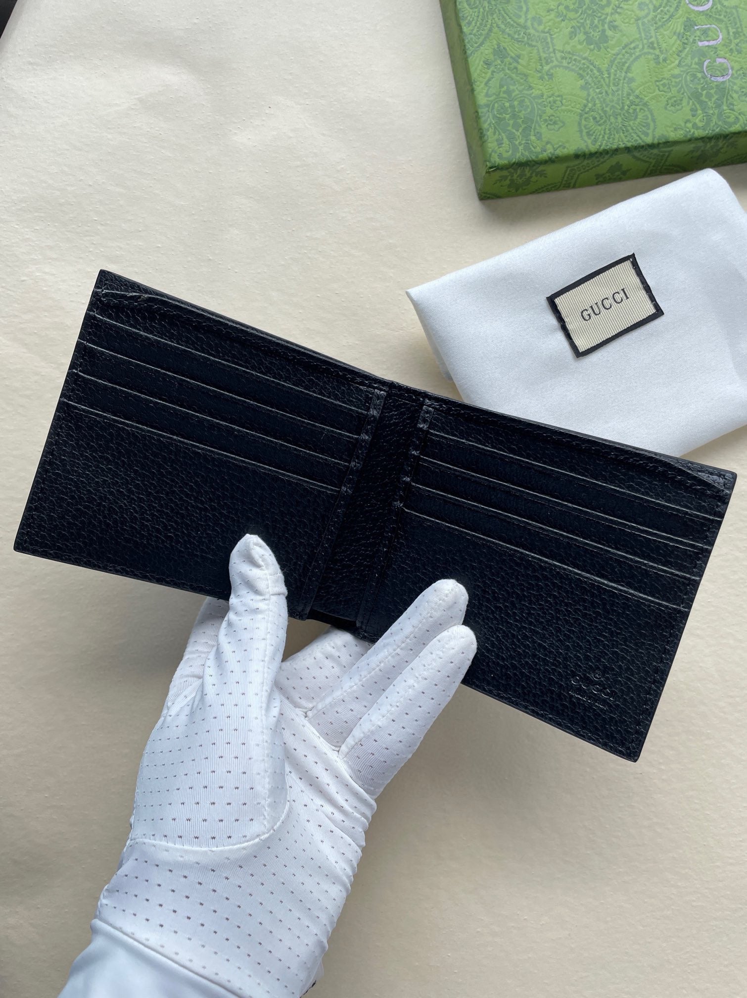 Gucci Black Embossed GG Calfskin Wallet