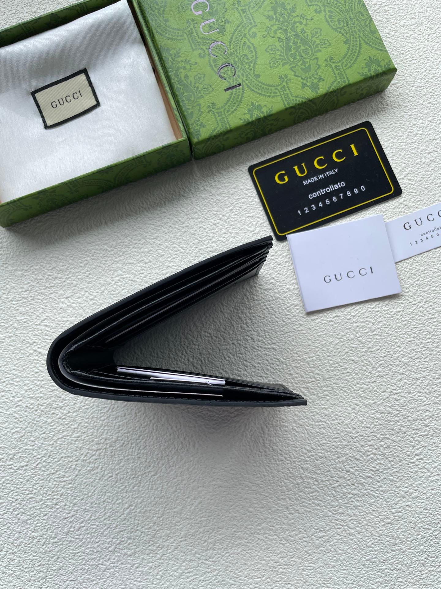 Gucci Black Leather Wallet – Gold GG Corner Emblem Edition