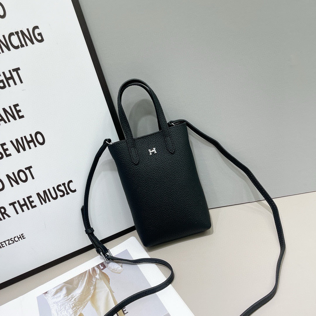 Hermès Compact Handbag Collection – Textured Leather with Metallic H Emblem