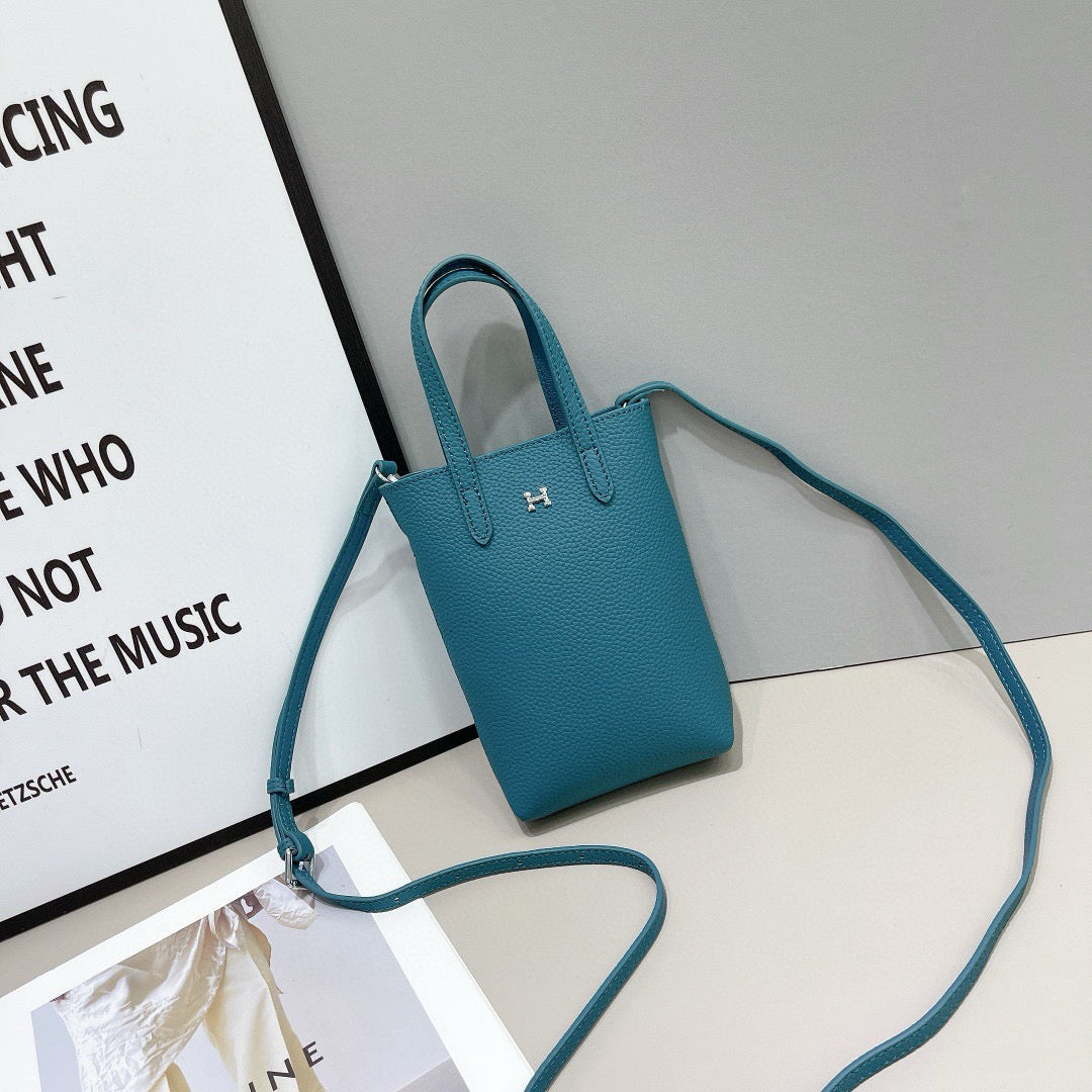 Hermès Compact Handbag Collection – Textured Leather with Metallic H Emblem