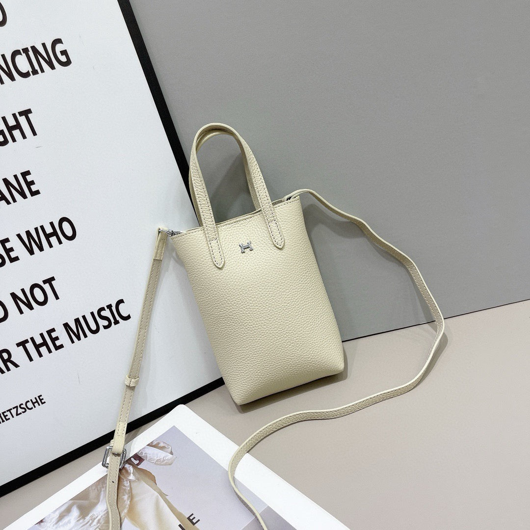 Hermès Compact Handbag Collection – Textured Leather with Metallic H Emblem