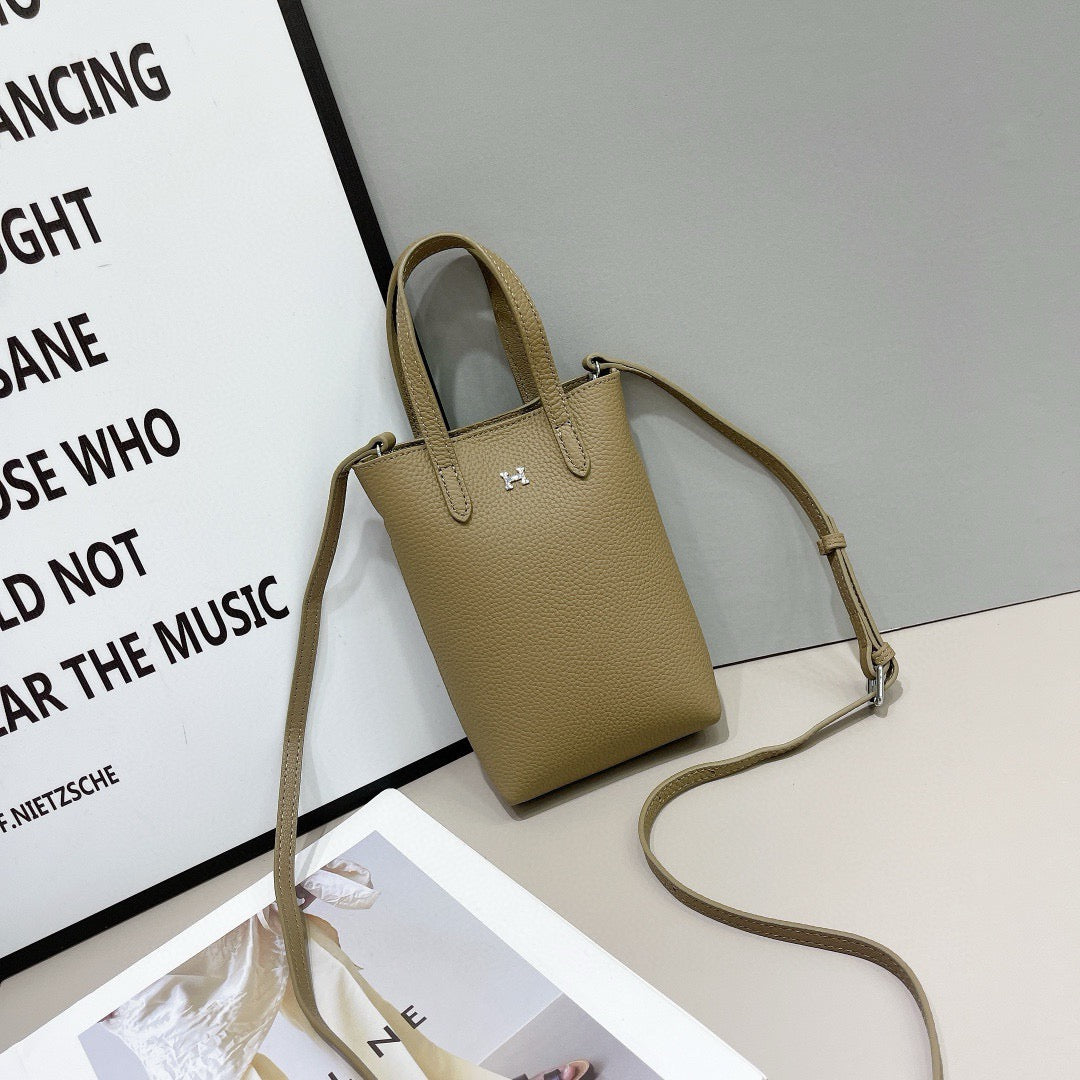 Hermès Compact Handbag Collection – Textured Leather with Metallic H Emblem