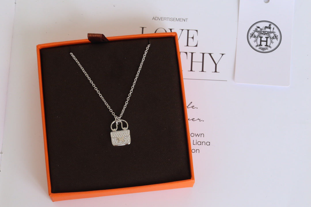 Hermès Padlock Pendant Necklace – Sparkling Stones on Fine Chain