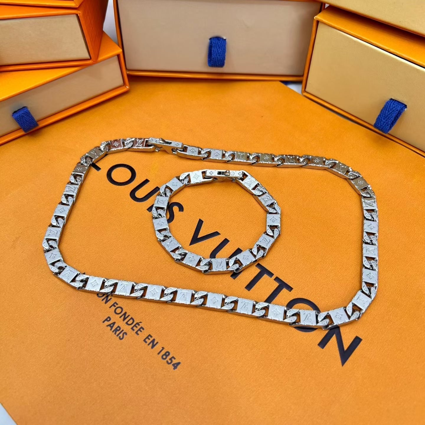 Louis Vuitton Silver Link Jewelry Set – Engraved Necklace & Bracelet with Monogram and Iconic Motifs
