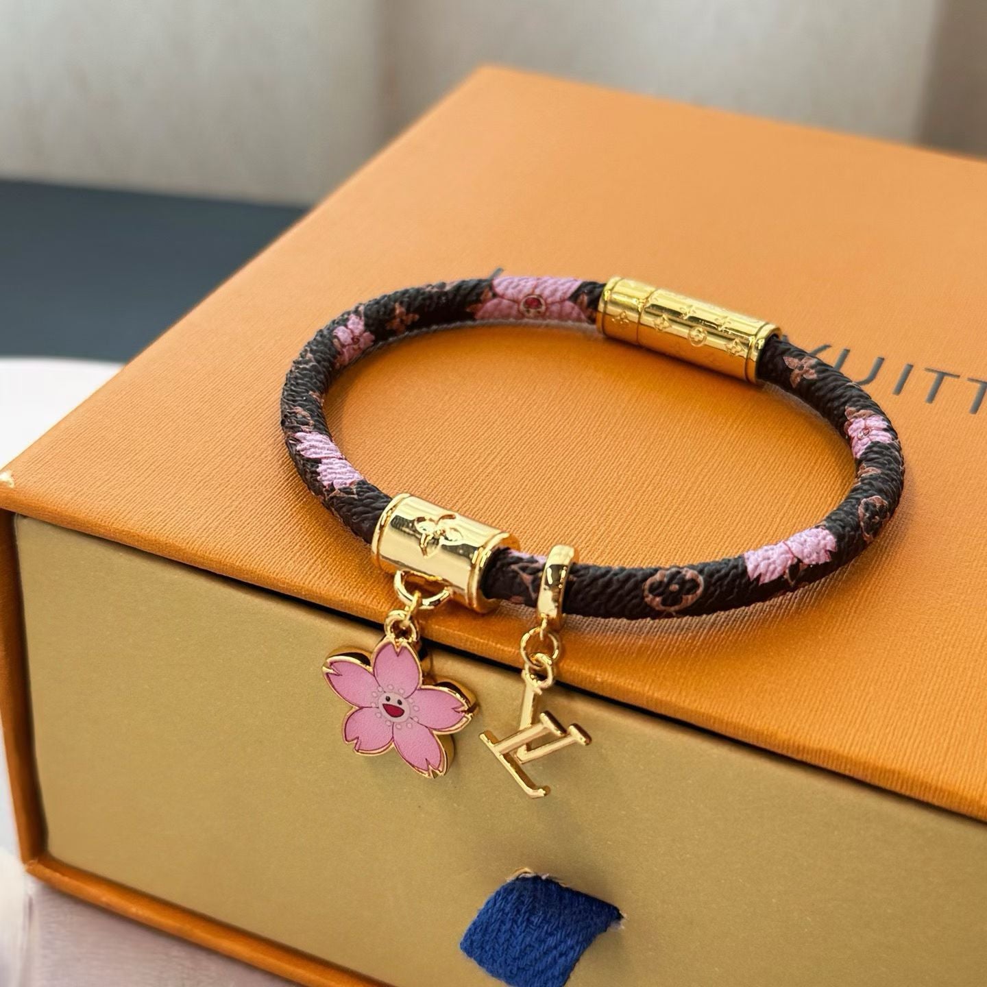 Louis Vuitton Cord Bracelet Pink Floral Accents with Gold-Toned Charms