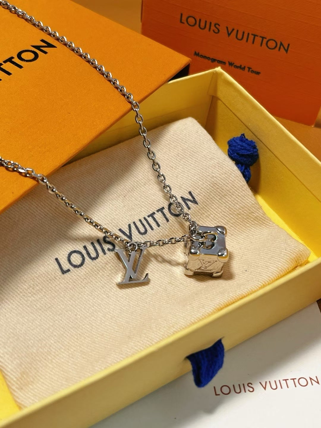 Louis Vuitton Cube & Logo Pendant Necklace – Gold-Tone with Monogram Detailing