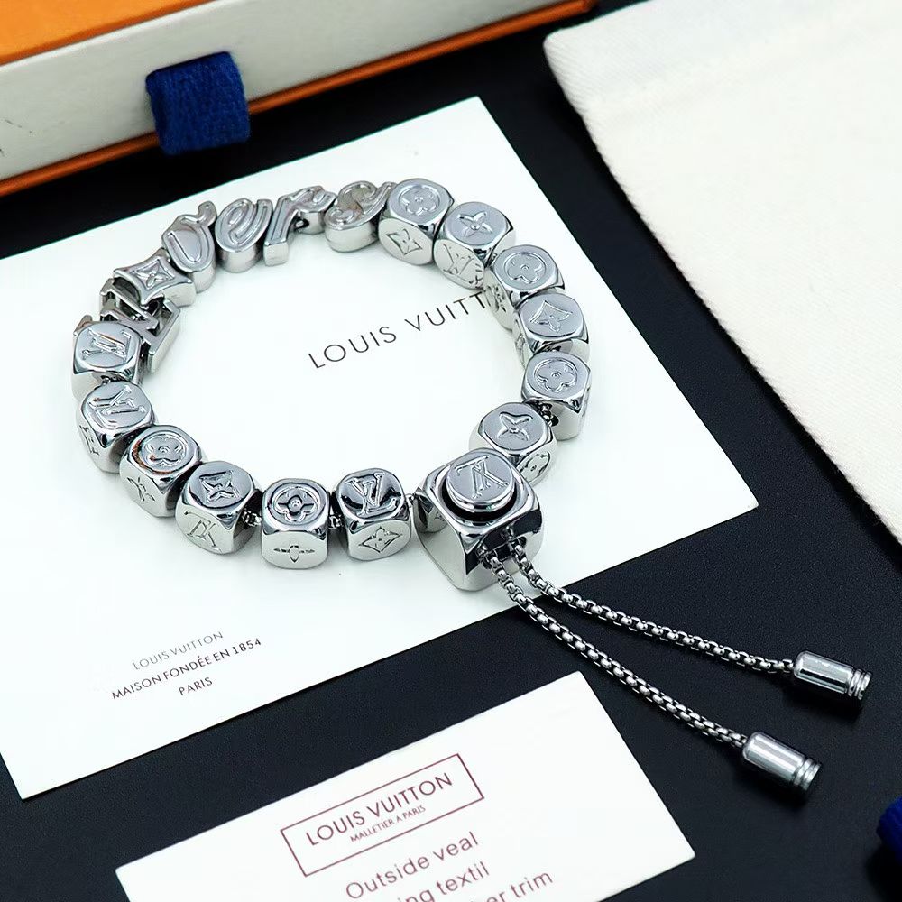 Louis Vuitton Monogram Link Bracelet – Circular Chain with LV Symbols in Silver & Gold