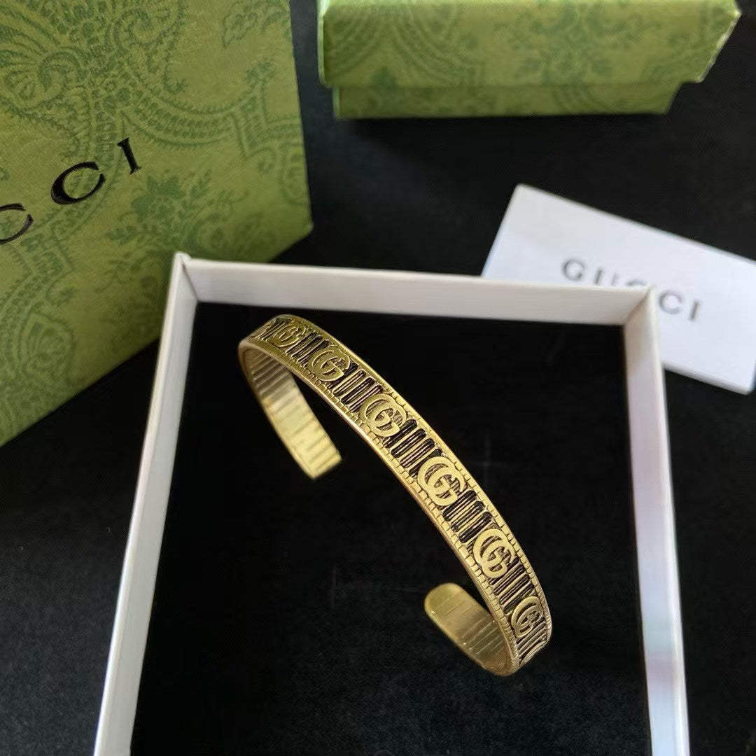 Gucci Cuff Bracelet Double G Motif – Engraved Striped Gold Brass