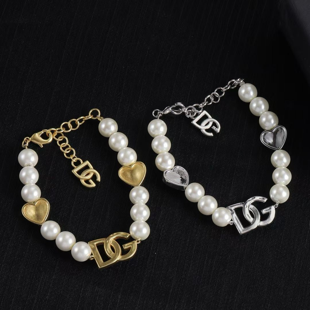 Dolce & Gabbana Pearl Charm Bracelet – White Pearls with Gold & Silver DG Logo and Hearts
