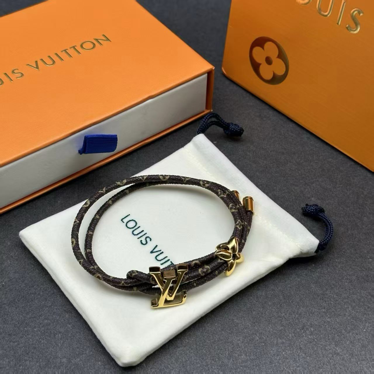 Louis Vuitton Monogram Leather Bracelet – Double Cord with Gold LV Logo & Flower Charm