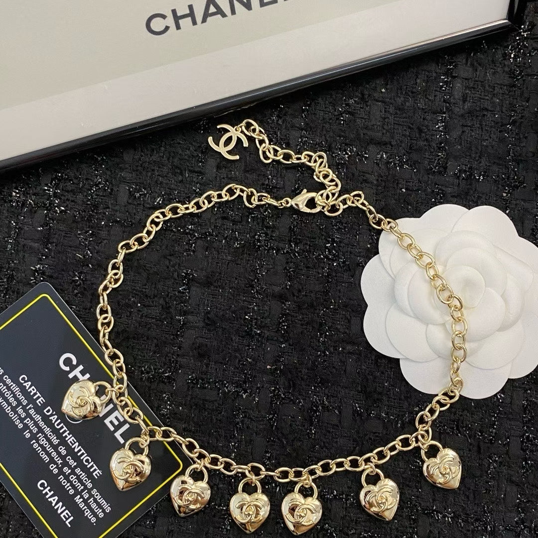 Chanel Heart Charm Necklace – Gold-Tone Chain with Embossed Double-C Logo