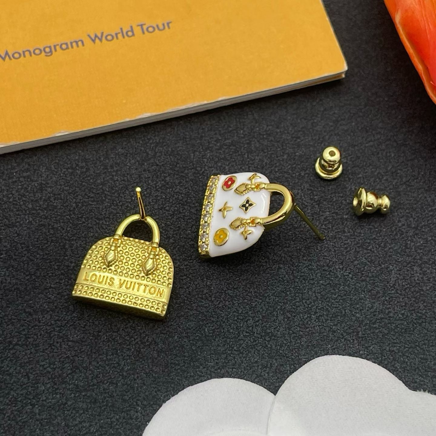 Louis Vuitton Mini Handbag Earrings – Monogram World Tour Edition in Gold & White