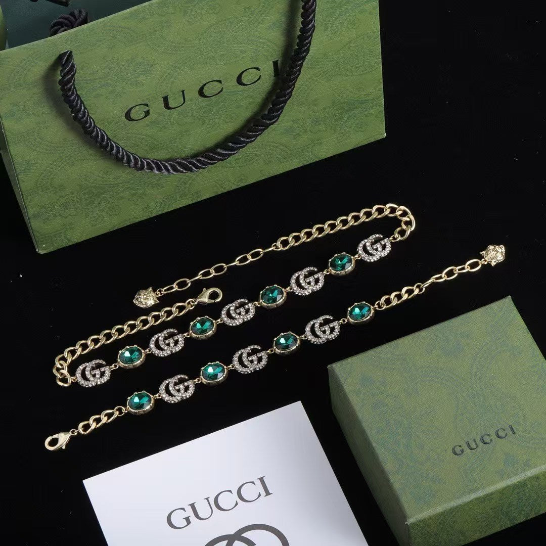 Gucci Green Gemstone Logo Jewelry Set – Gold-Tone Necklace & Bracelet Duo