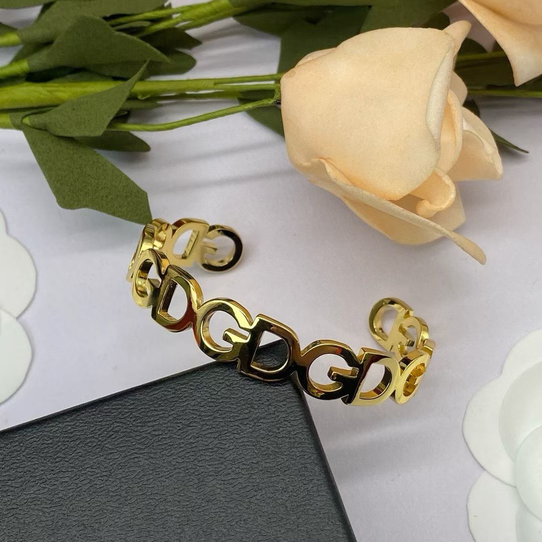 Dolce & Gabbana GD Link Bracelet – Polished Gold & Silver Open Cuff Design