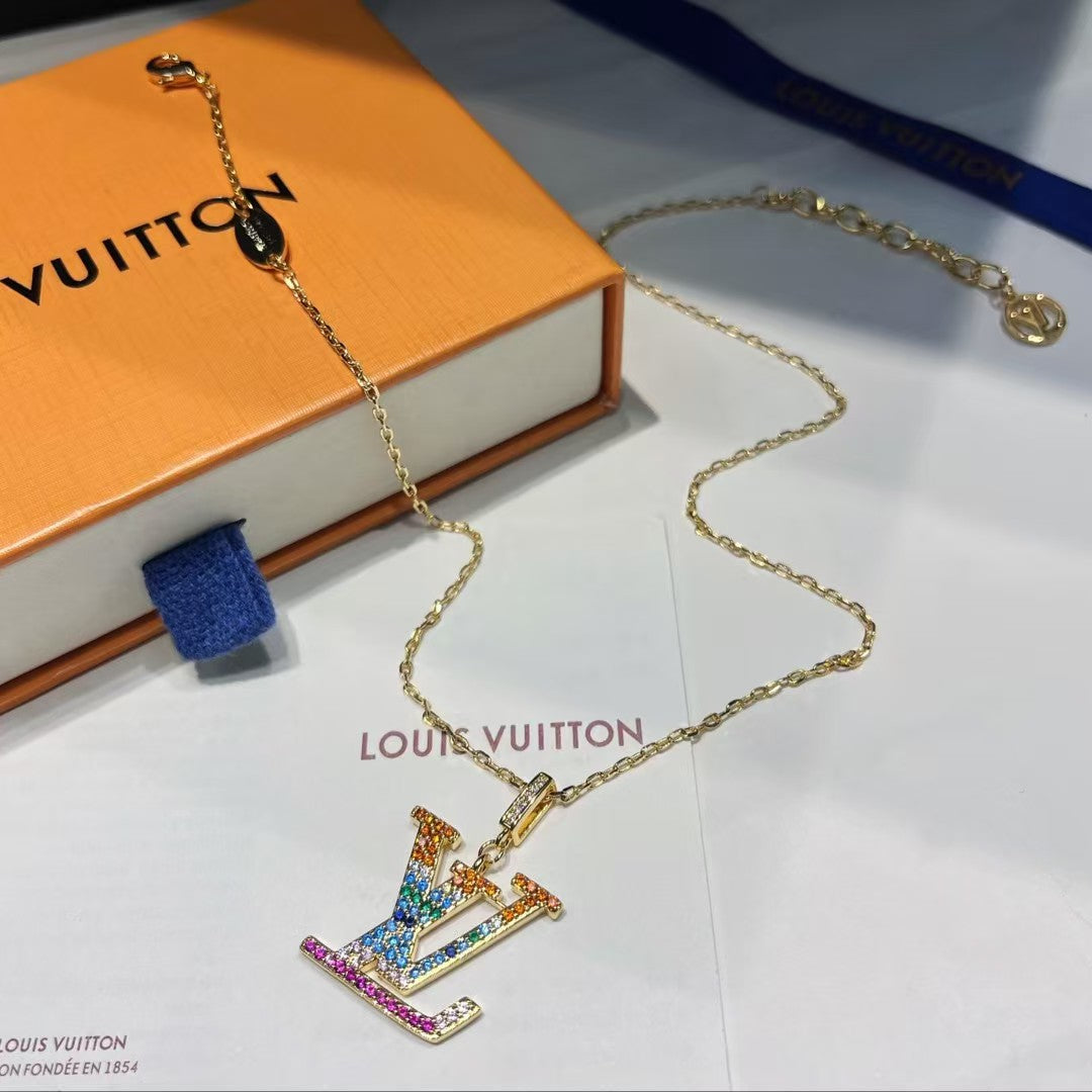 Louis Vuitton LV Pendant Necklace Trio – Gold & Silver Chains with Gem-Encrusted Logo Pendants