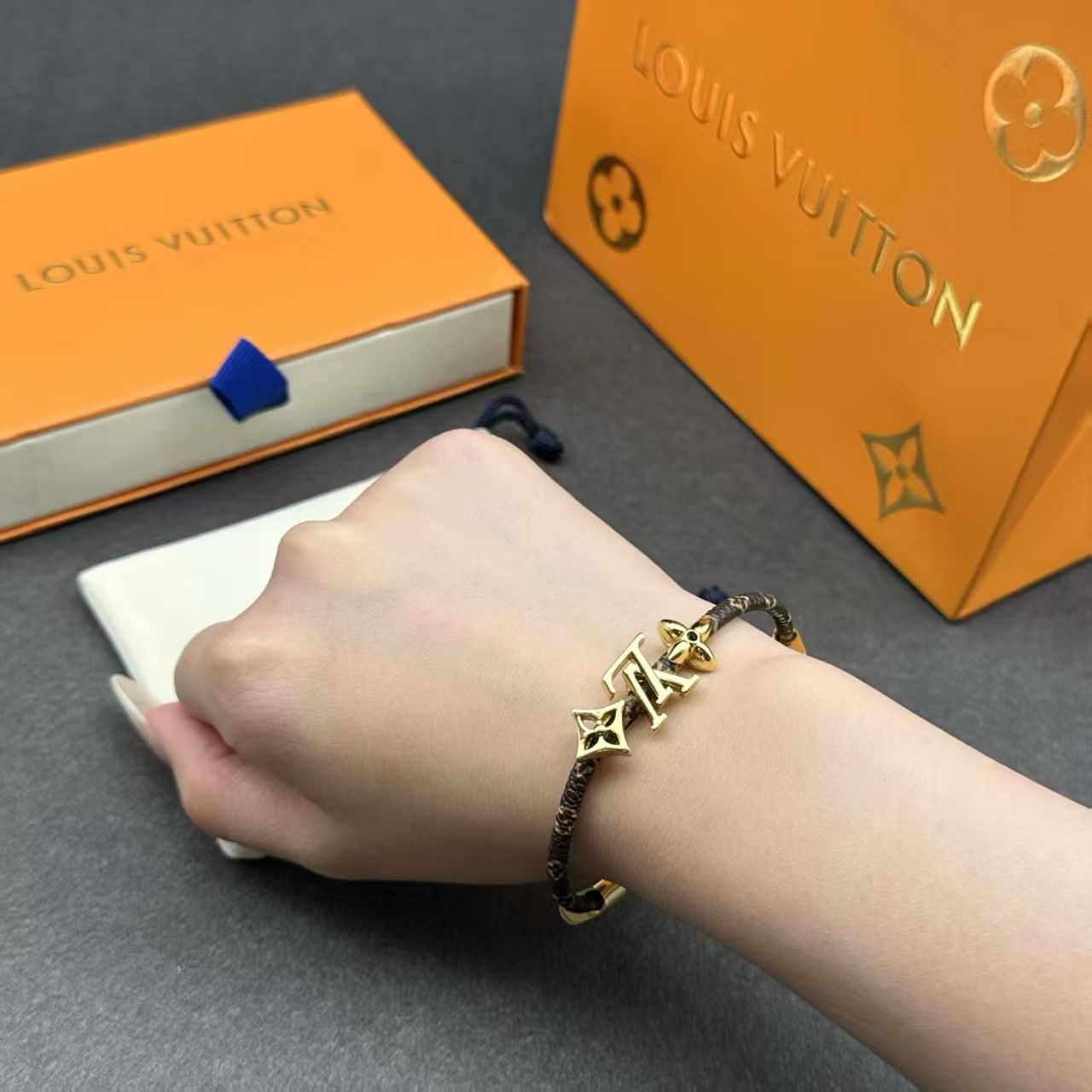 Louis Vuitton Monogram Leather Bracelet – Double Cord with Gold LV Logo & Flower Charm