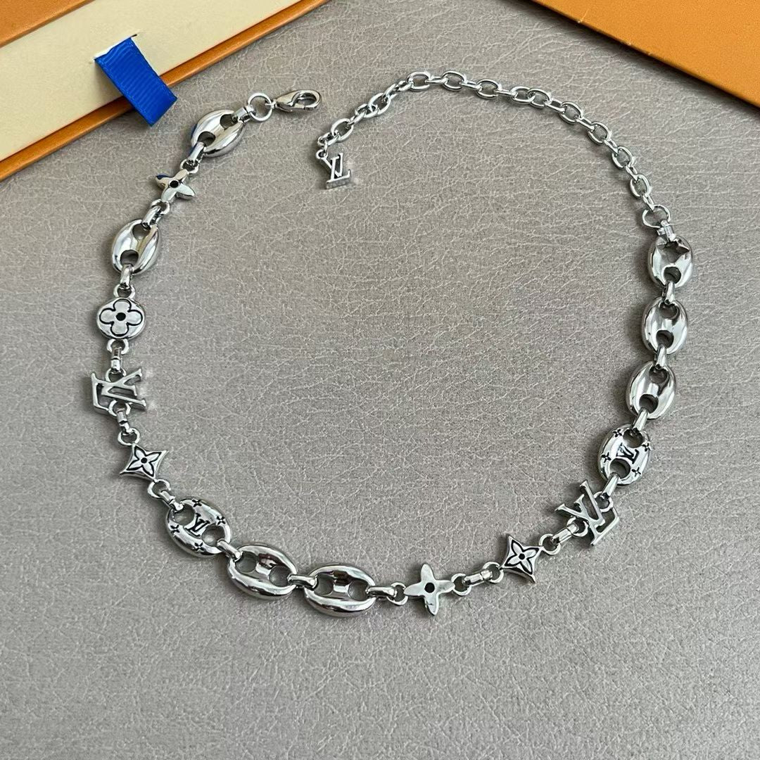 Louis Vuitton Monogram Jewelry Set – Silver Necklace & Bracelet with LV Logo & Floral Motifs