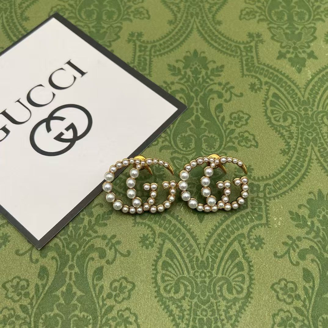 Gucci Pearl GG Logo Earrings – Gold-Tone Interlocking GG with White Pearl Detailing