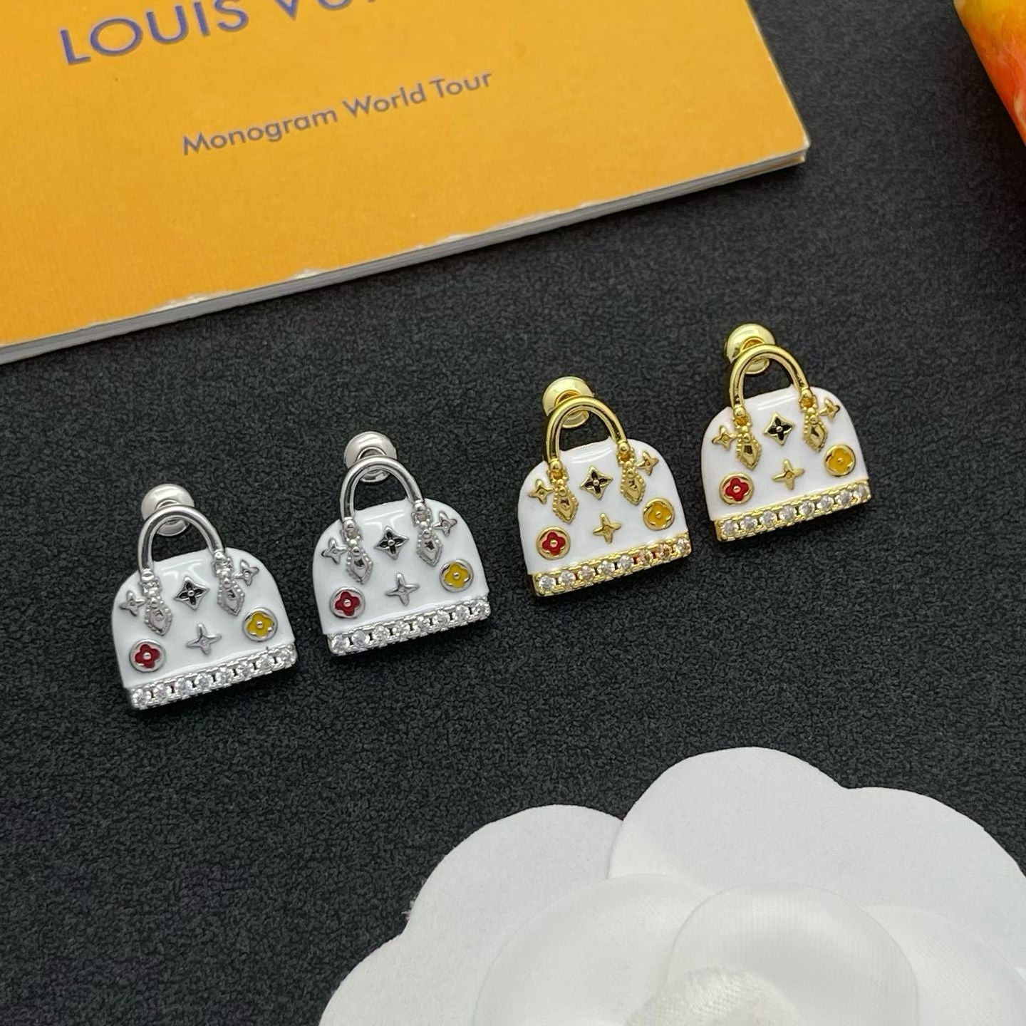 Louis Vuitton Mini Handbag Earrings – Monogram World Tour Edition in Gold & White